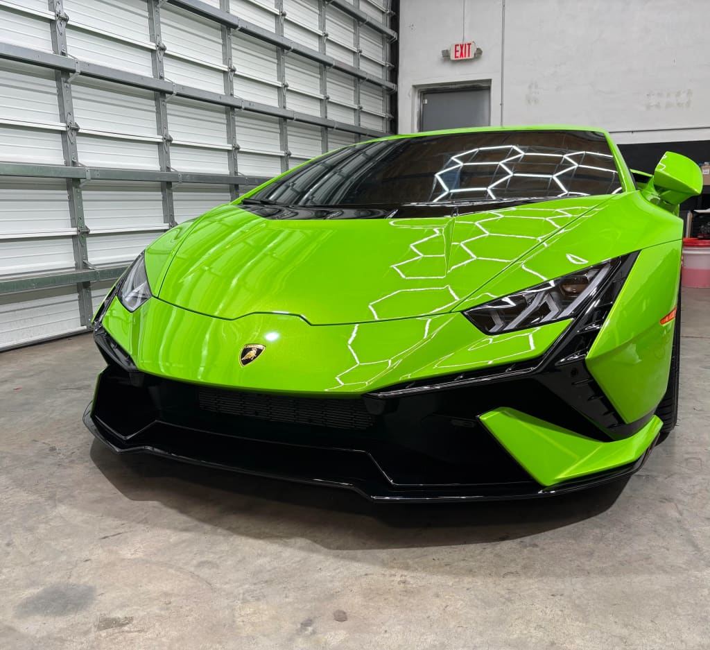 Lamborghini showing the finished result after paint protection film, tint, and a full detail